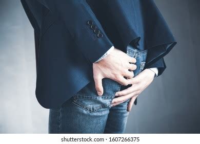 Man Holding His Bottom Images Stock Photos D Objects Vectors Shutterstock