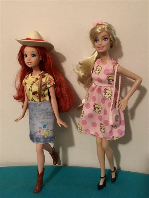 Barbie And Ariel Wearing Their New Toy Story 4 Outfits Flickr