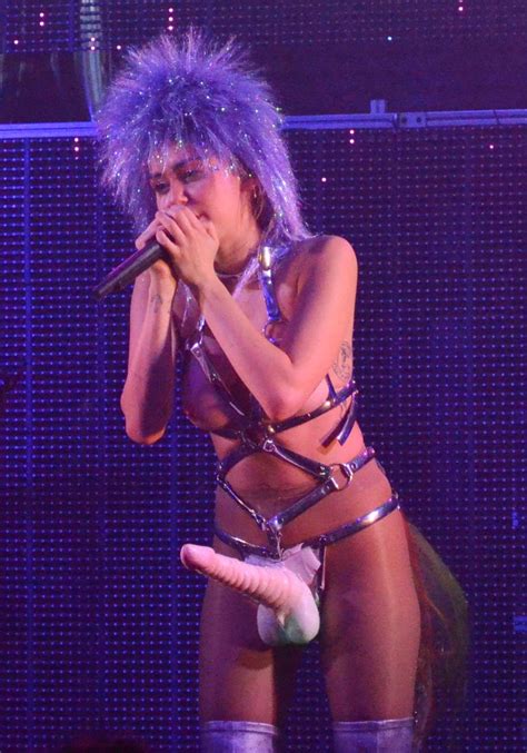 Nsfw Miley Cyrus Performs Topless Wearing A Giant Strap The Best Porn