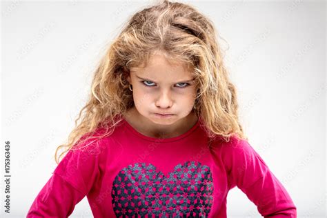 Preteen Sulky Girl Making Angry Face Foto De Stock Adobe Stock