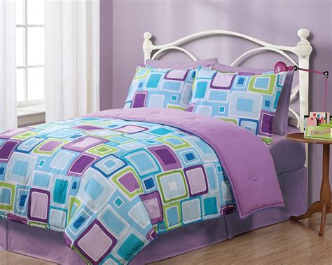 If you're going for a complete overhaul, add matching sheets, drapes and other accents. Twin Geo Aqua Square Reversible Comforter Set