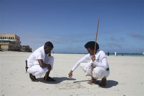 Two Men In Traditional Somalia Afro Dress Match In Liido Beach In