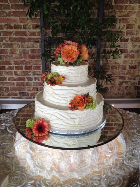 Maybe you would like to learn more about one of these? Coral flowers on a 3-tiered cake | Wedding cakes, Coral ...