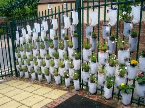 36 Handmade Recycled Bottle Ideas For Vertical Garden Bottle Garden