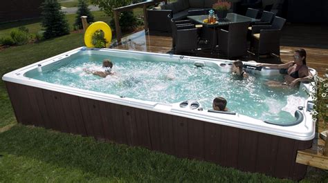 People Are Relaxing In An Outdoor Hot Tub