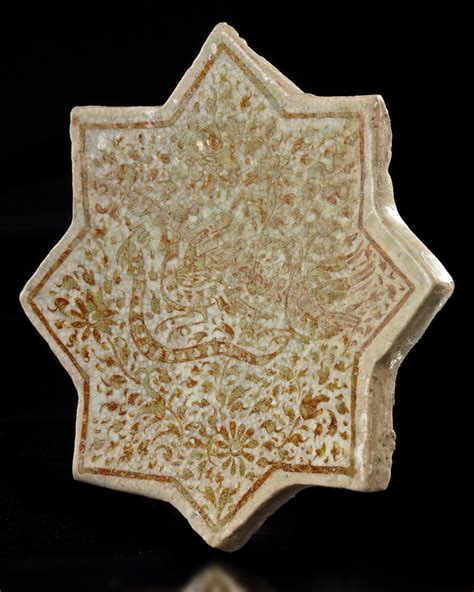 a kashan lustre pottery star tile persia 13th century