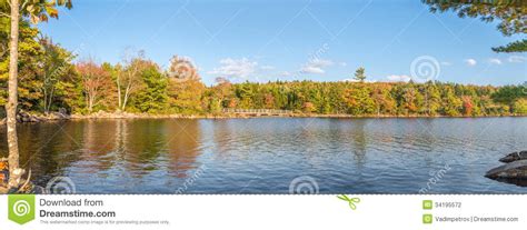 Idyllic Fall Foliage Scene With Reflections On Lake Stock Photo Image