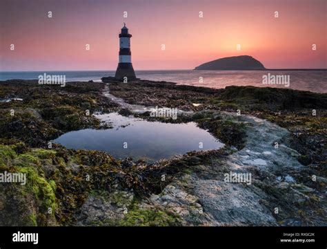 Trwyn Du Lighthouse Or Penmon Point Lighthouse And Puffin Island At