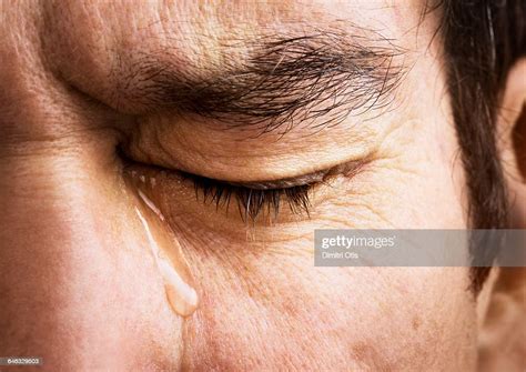 Man Crying Closeup Of Eye And Tear Photo Getty Images