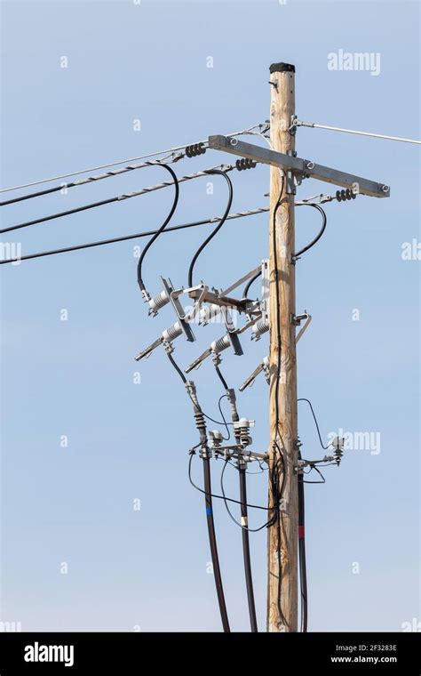 Utility Pole With Medium Voltage Disconnect Switch And Cable