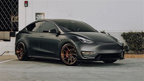 Satin Black Tesla Model Y Blends Modern Ev Looks With Ritzy Antique