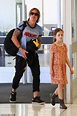 Keith Urban strolls through the airport with daughters Sunday Rose, 10 ...