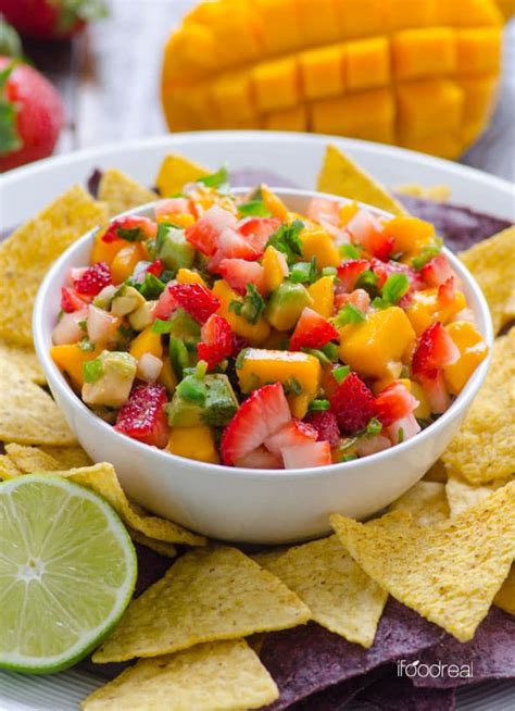 This colorful mango salsa recipe is so easy to make! Strawberry Mango Salsa Recipe - iFOODreal - Healthy Family Recipes