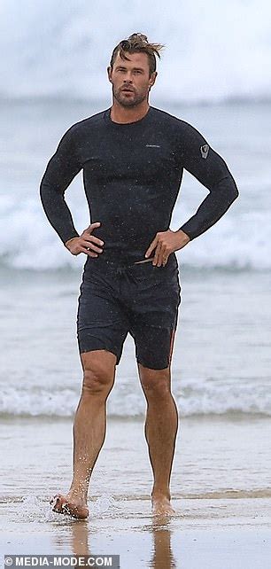 Chris Hemsworth Puts His Muscles On Display In Skintight Rash Vest