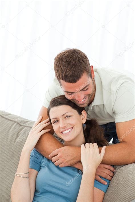 Portrait Of A Cute Couple Hugging In The Living Room — Stock Photo