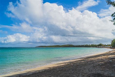 Seven Sea Beach In Tropical Fajardo Puerto Rico And White Puffy Clouds