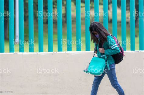 Mexican Schoolgirl Walking And Crying On Back To School After