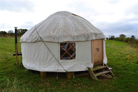 This yurt has a queen sofa sleeper on walk in level. REAL CUT FLOWERS: yurt for sale