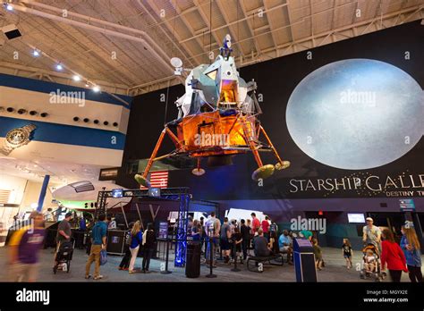 nasa space centre houston visitors looking at the apollo lunar landing module at the johnson