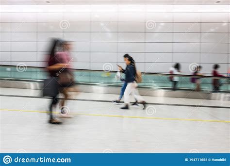 Motion Blur Of People Walking Editorial Photography Image Of Airport