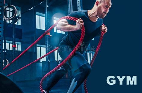 Men With Battle Rope Battle Ropes Exercise In The Fitness Gym Stock