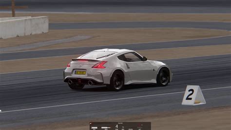 Assetto Corsa Racing A Lap With The Nissan Z Nismo On Laguna Seca