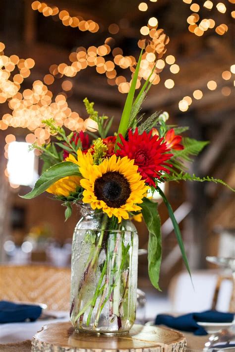 Vibrant Gerbera Daisy And Sunflower Centerpieces