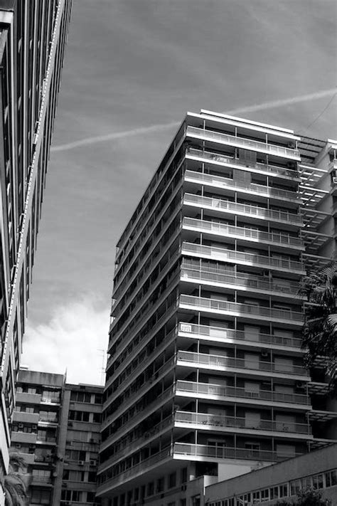 Grayscale Photography Of High Rise Buildings · Free Stock Photo