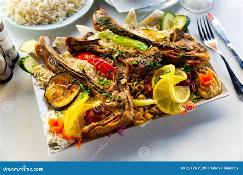 Rice Pilaf With Lamb Meat And Vegetables In Rectangular Bowl Stock