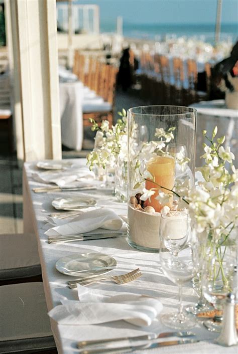 One of my friends got married last july and had a beach theme. Reception Décor Photos - Beach-Themed Centerpiece - Inside ...