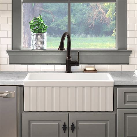 The most common materials you will come across are: Victoria 30″ Fireclay Farmhouse Kitchen Sink with Fluted ...