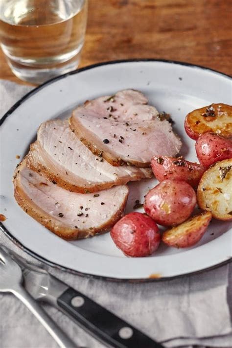 Step 4 bake 30 to 35 minutes or until meat thermometer registers 160°f. Roasted Rosemary and Garlic Pork Loin and Potatoes ...