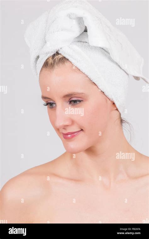 Beautiful Woman After Shower With White Towel Wrapped On Her Head Stock Photo Alamy