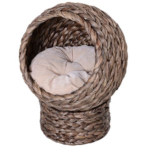 Airy but sturdy with an embracing feel makes it perfect to curl up in. PawHut Hooded Rattan Wicker Elevated Cat House W/ Mat ...