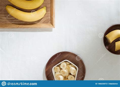Bananas And Banana Pieces In A Wooden Plate Stock Image Image Of