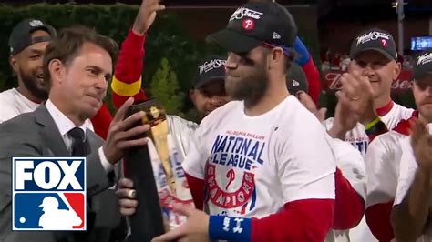 Phillies Hoist The Trophy After Winning The Nlcs Bryce Harper Wins