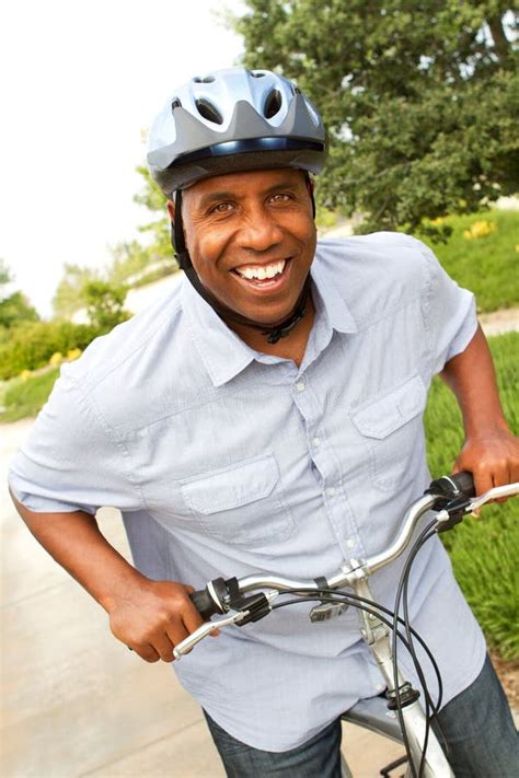 African American Man Riding A Bike Stock Image Image Of Vitality