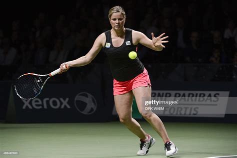 Former Belgian Tennis Player Kim Clijsters Returns The Ball To German