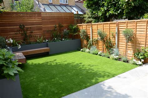 Some of the many considerations include creating a functional slope, drainage, soil retention and blending smaller lots with grades extending up from the house provide the perfect space for creating waterfalls, rock gardens and terraces. small garden design fake grass low mainteance contempoary ...