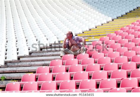 Man Sitting Alone Empty Stadium Stock Photo 91165655 Shutterstock