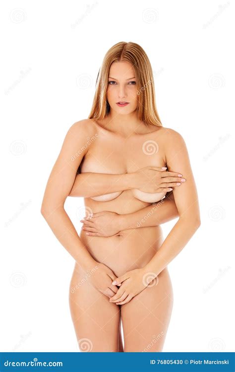Front View Of Nude Woman Covering Her Intimate Places Stock Photo