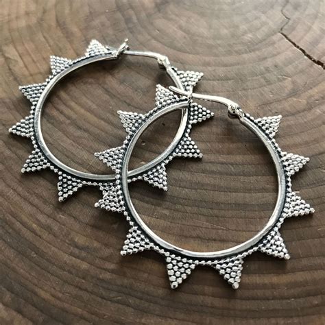 Sterling silver looks great on anyone, making it an ideal metal to wear, and hoop earrings can easily update your outfit without requiring you to give a lot of effort. Sterling Silver Hoop Earrings, Large Exotic Silver Hoops ...