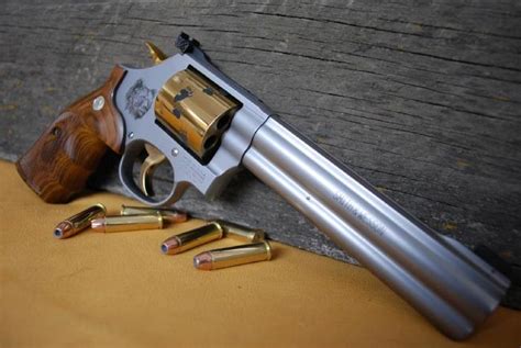 Magnum research desert eagle mark xix titanium gold.357 magnum pistol review. Smith & Wesson M686 357 Mag. Gold Bear Edition For Sale at GunAuction.com - 9630805