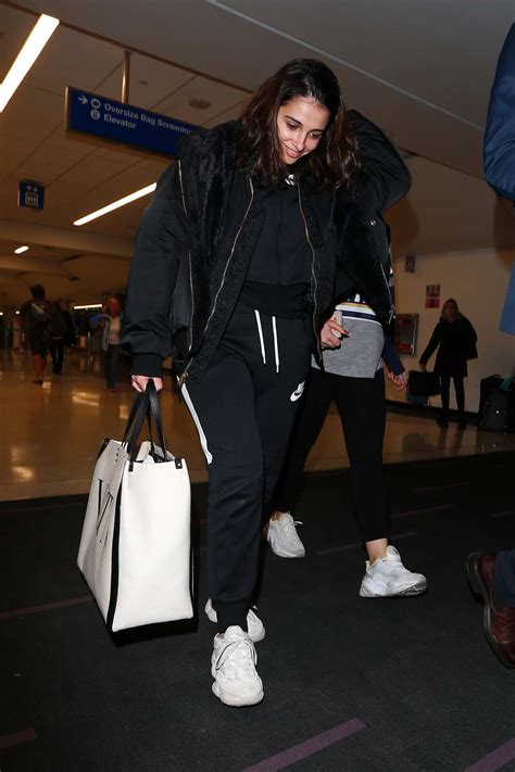 Naomi Scott Keeps It Casual As She Arrives To Catch A Flight Out Of Lax