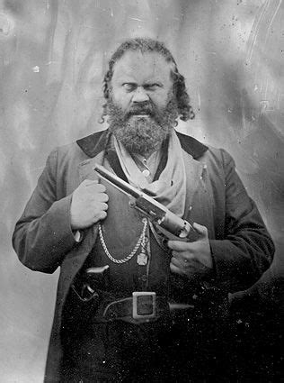 Qu striking front on historical photograph of a rough and dangerious wild west outlaw taking an aggressive square aim with stone and stick sling shot. Dead Outlaws Images Old West | Black Bart the Legend by ...