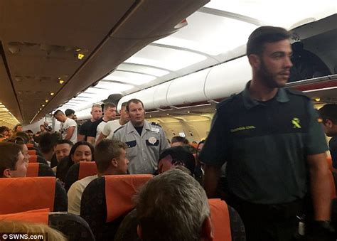 Spanish Police Escort Five Abusive British Men Off Easyjet Flight In Ibiza Daily Mail Online