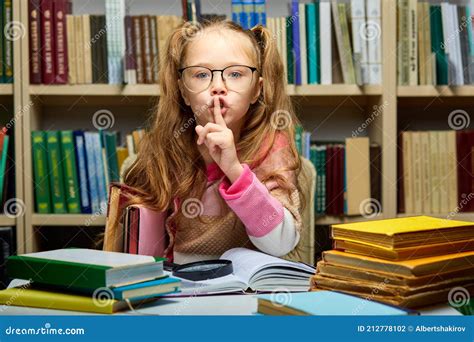 Beautiful Kid Girl Asks To Be Quiet In Library Stock Photo Image Of