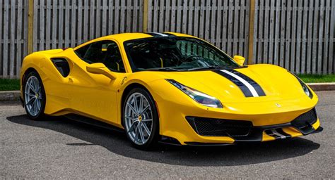 In the silver corner, we have a ferrari 488 pista with a full novitec carbon fiber aero kit and a tasty set of hre wheels. What's A 2019 Ferrari 488 Pista Worth To You? | Carscoops