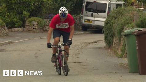 Father Riding Late Daughter S Tiny Bike Miles For Charity BBC News