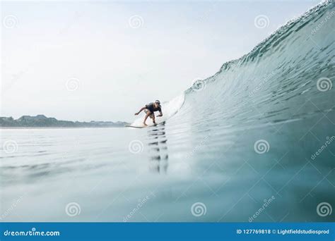 Young Sportive Man Riding Surfboard Stock Photo Image Of Handsome